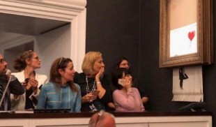 Momentul în care „Girl With Balloon”, lucrarea lui Banksy, s-a autodistrus după adjudecare
